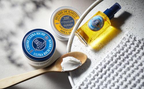 a wooden spoon with butter and a bottle of mustard at Mansard Riyadh, a Radisson Collection Hotel in Riyadh