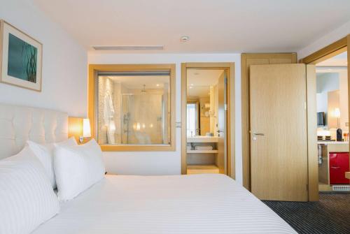 Ένα ή περισσότερα κρεβάτια σε δωμάτιο στο Wyndham Ankara