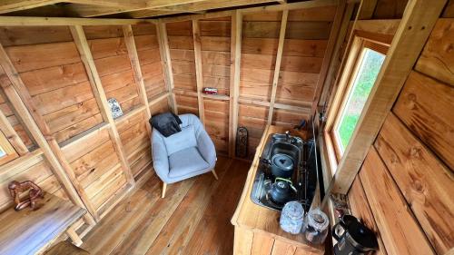 an overhead view of a room in a tiny house at Cosy Little Hut in Launceston