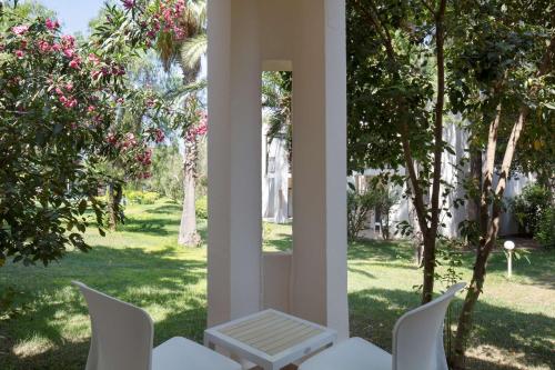 Κήπος έξω από το DoubleTree by Hilton Bodrum Isil Club Ultra All-Inclusive Resort