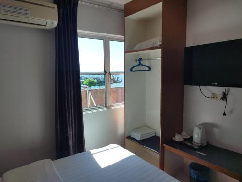 Katil atau katil-katil dalam bilik di Marine Bay Hotel