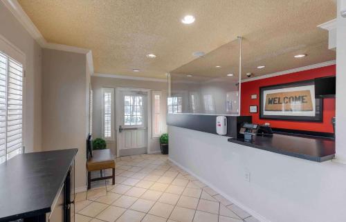 a large kitchen with a counter and a counter top at Extended Stay America Suites - Arlington in Arlington