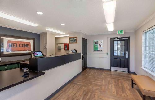 a lobby of a waiting room with a cash register at Extended Stay America Suites - Denver - Tech Center South - Inverness in Centennial