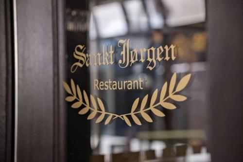 a sign that says santa clara restaurant on a door at Best Western Plus Hotel Eyde in Herning