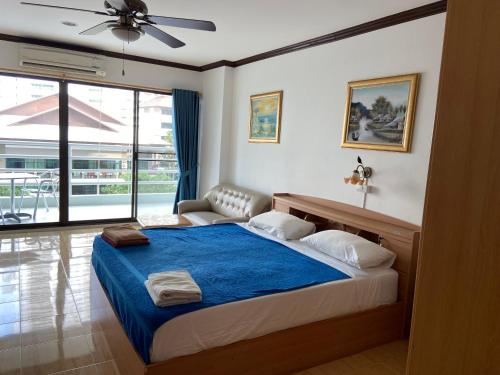 Giường trong phòng chung tại View Talay 5 at Nong Apartment