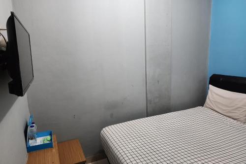 Ένα ή περισσότερα κρεβάτια σε δωμάτιο στο BARADA ROOMS