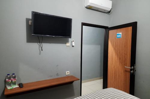 Μια τηλεόραση ή/και κέντρο ψυχαγωγίας στο BARADA ROOMS