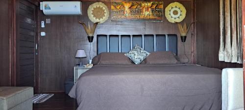 Кровать или кровати в номере Villa Senja Lombok