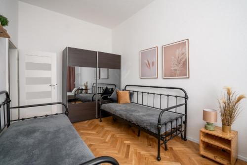 Posteľ alebo postele v izbe v ubytovaní A.S. Home Świdnicka Street