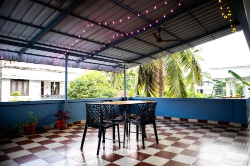 Un balcon sau o terasă la Padmanabhan's Homestay in Thrissur, Punkunnam