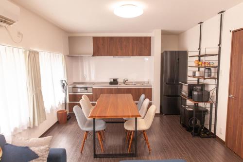 Η κουζίνα ή μικρή κουζίνα στο ツナゲル青森安方Villa Suite