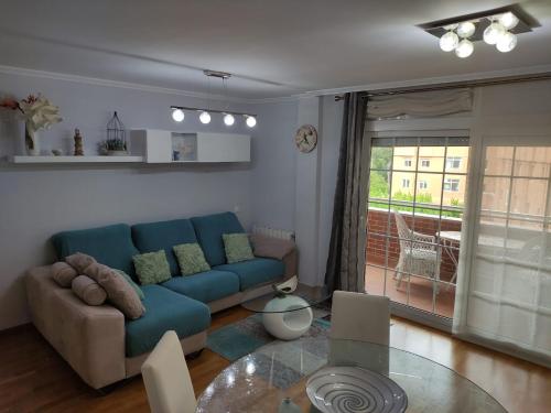 Posezení v ubytování Piso familiar 3 habitaciones 2 baños y plaza de parking