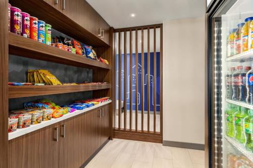 a walk in pantry with a lot of food at Holiday Inn Express - Strathroy by IHG in Strathroy