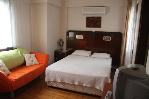 Cama o camas de una habitación en Uzum Hotel