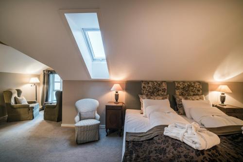Katil atau katil-katil dalam bilik di Angvik Gamle Handelssted - by Classic Norway Hotels