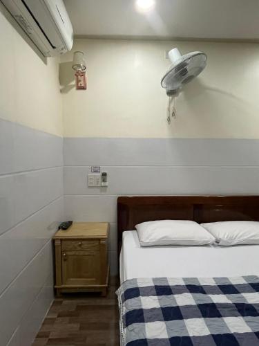 Postel nebo postele na pokoji v ubytování Căn hộ Tường Mơ (An Tâm Hotel)