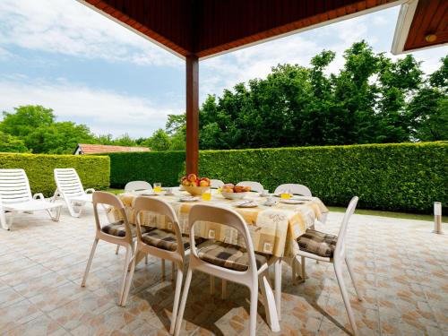 Balkón nebo terasa v ubytování Holiday Home Narcisse by Interhome