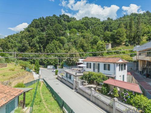 an empty street in a small town with houses at Holiday Home Casa di Giò by Interhome in Marina di Massa