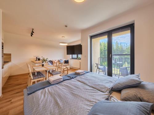 Postel nebo postele na pokoji v ubytování Studio Černý Důl-1 by Interhome