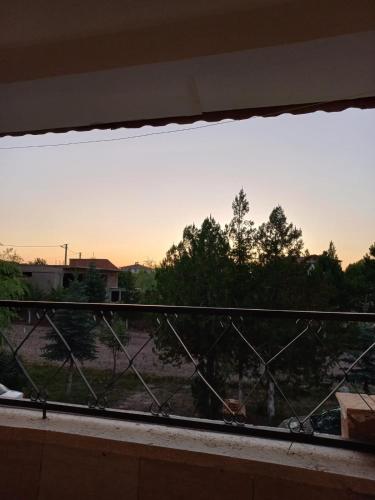 an open window with a view of a field at Akar Hotel in Ihlara