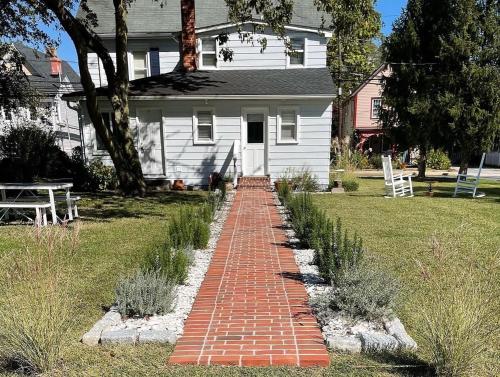 a brick path in front of a house at Farmhouse 316 of Milton in Milton