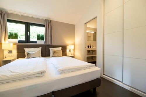 Katil atau katil-katil dalam bilik di Villas Winterberg