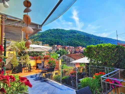 a balcony with a view of a city at Pietra Di Mare in Biassa