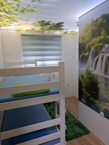 Postel nebo postele na pokoji v ubytování Stan na danS Šid