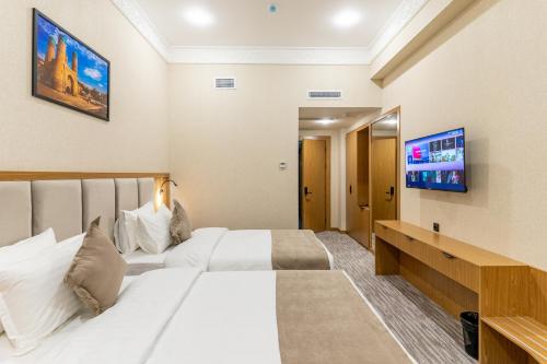 Televisyen dan/atau pusat hiburan di MIRZO HOTEL