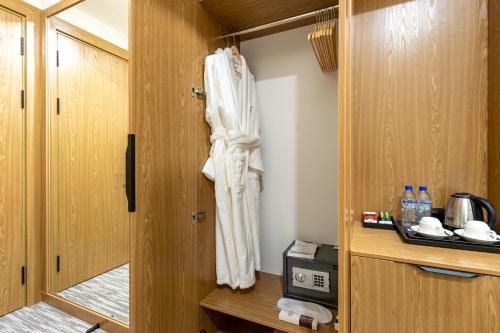 Katil atau katil-katil dalam bilik di MIRZO HOTEL