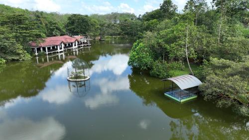 an aerial view of a river with houses on it at Lake Serenity Resort & Spa in Kuruwita