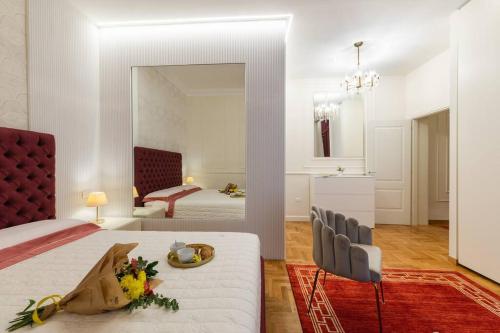 a hotel room with a bed and a mirror at Domus Quirinale in Rome