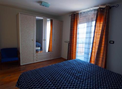 Ένα ή περισσότερα κρεβάτια σε δωμάτιο στο Apartman Mimi