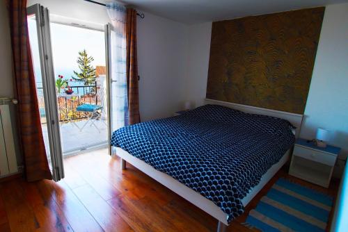 Ένα ή περισσότερα κρεβάτια σε δωμάτιο στο Apartman Mimi