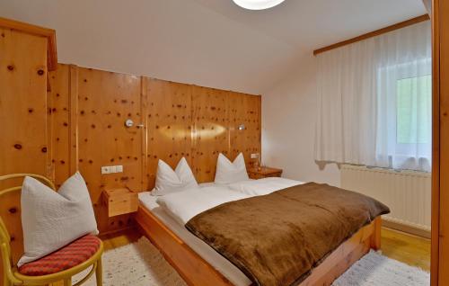 Llit o llits en una habitació de Bergchalet Emberg