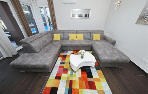 a living room with a couch and a coffee table at Villa Nerina in Nin