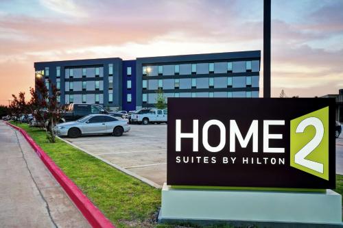a sign that reads home suites byillion in front of a building at Home2 Suites By Hilton El Reno in El Reno