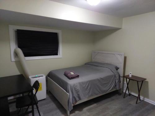 Un pat sau paturi într-o cameră la Casa Cerca De La Playa