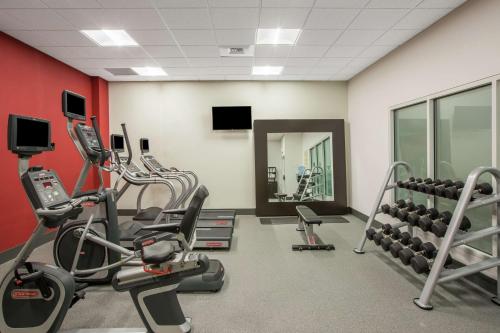 a gym with treadmills and cardio equipment in a room at Hilton Garden Inn Olympia, WA in Olympia