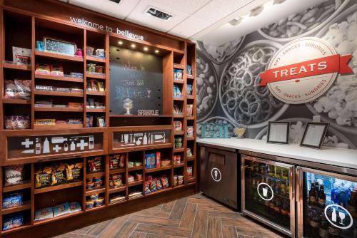 a store with a treats counter in a pharmacy at Hampton Inn Bellevue in Bellevue