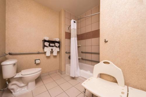 a bathroom with a toilet and a sink at Hampton Inn & Suites Ontario in Ontario