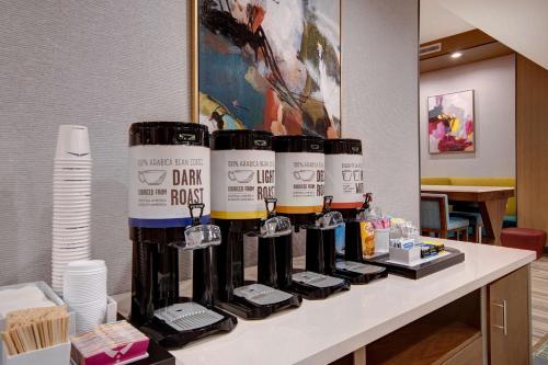 a group of bottles of wine sitting on a counter at Hampton Inn & Suites By Hilton Rancho Cucamonga in Rancho Cucamonga