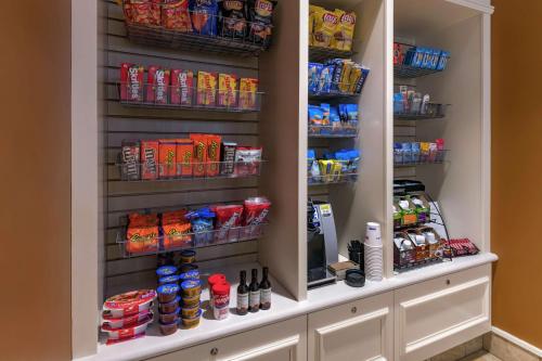 a pantry filled with lots of food and drinks at Hilton Garden Inn Devens Common in Devens