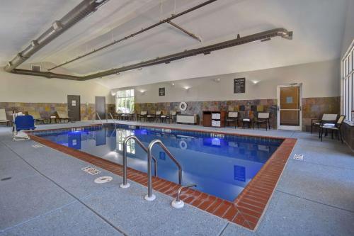a large swimming pool in a large room at Homewood Suites by Hilton Philadelphia-Great Valley in Malvern