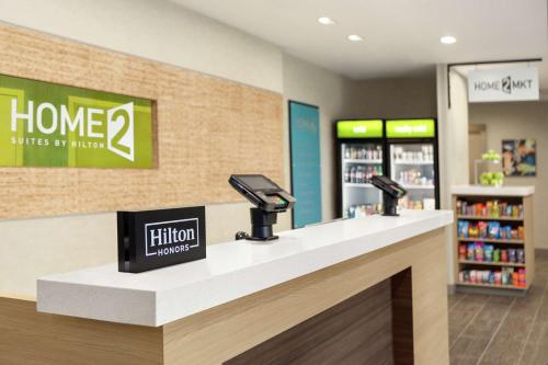a store counter with a home smilesysys pharmacy at Home2 Suites By Hilton Ridley Park Philadelphia Airport So in Ridley Park