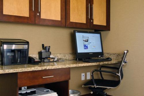 a computer sitting on a counter in a hotel room at Hampton Inn & Suites Philadelphia/Bensalem in Bensalem
