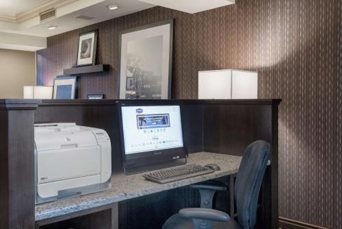 an office with a computer and a printer on a desk at Hampton Inn & Suites Valley Forge/Oaks in Phoenixville