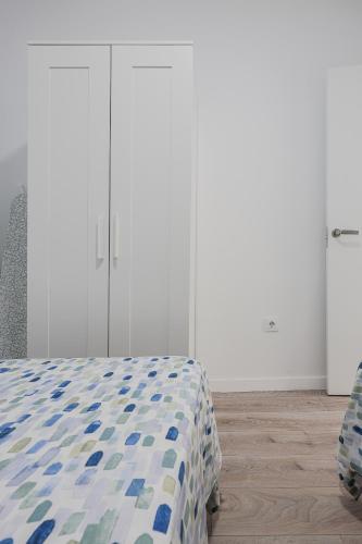 Postel nebo postele na pokoji v ubytování Algaba Severo Ochoa