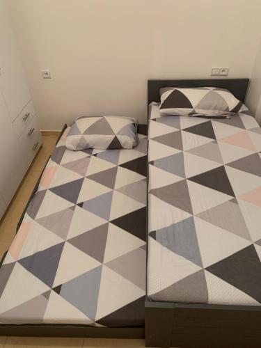 Postel nebo postele na pokoji v ubytování 2 slaapkamer appartement in alhoceima
