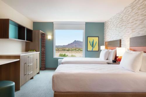 Postel nebo postele na pokoji v ubytování Home2 Suites By Hilton Mesa Longbow, Az